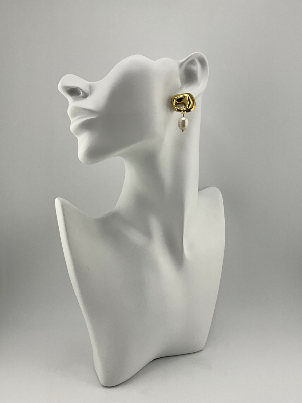 Modern Statement Drop Earrings is our Earrings from Trendy Modern of the Gold and Pearl Collection