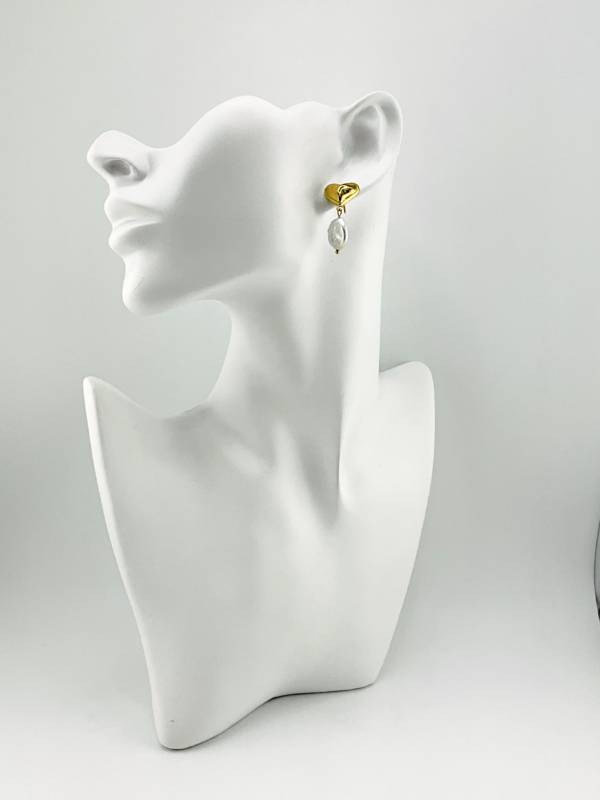 Melted Heart and River Pearl is our Earrings from Trendy of the Gold and Pearl Collection