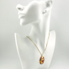 Maroon Gold Flower Pendant Necklace from our in Fashion Jewelry Collection