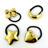 Golden Hair Tie Indulgence: Trending Jewelry of the Embrace of the Heart Collection