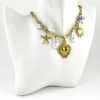 Coastal Charm: Sun, Sea, and Sacred Heart Necklace of the Embrace of the Love Heart Collection